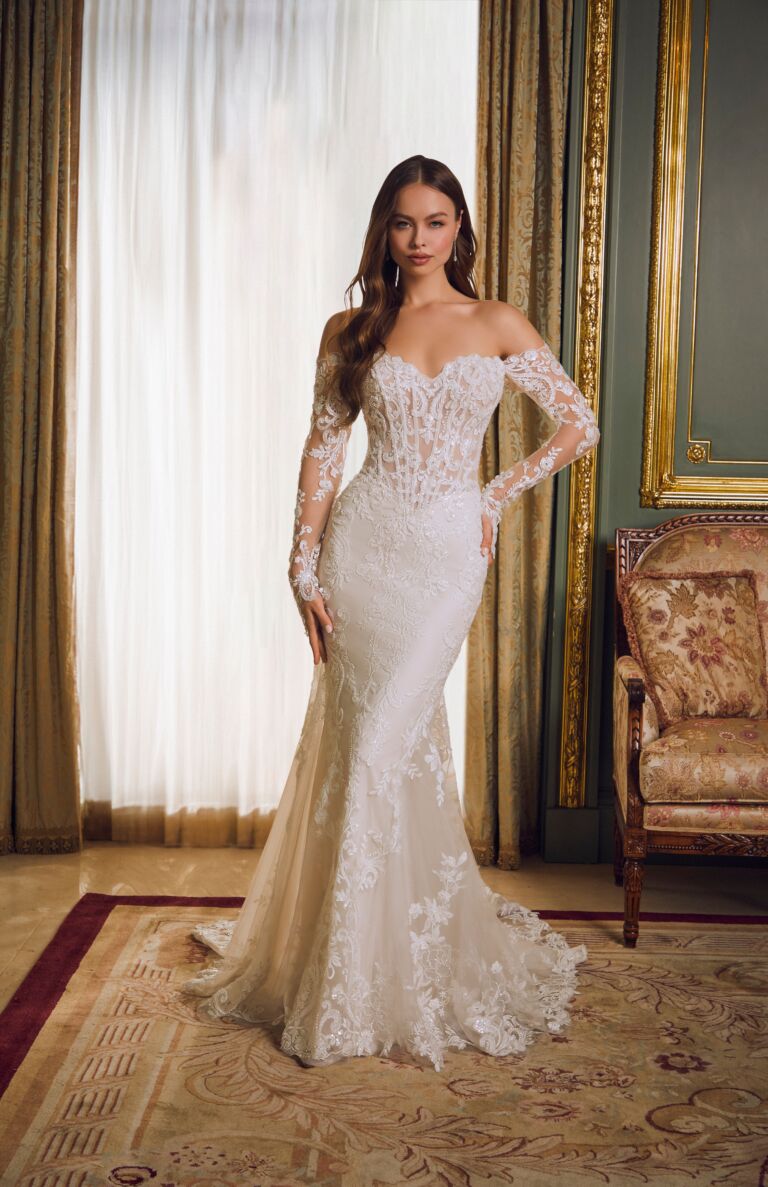 Rochelle by Mori Lee, an off-the-shoulder lace wedding dress with sheer sleeves